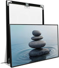 Zen wall art Harmonious grey stones stacked on a calm surface of water Serene Zen decor suitable for tranquil homes and spaces of meditation 24x36in Metal blackFramed