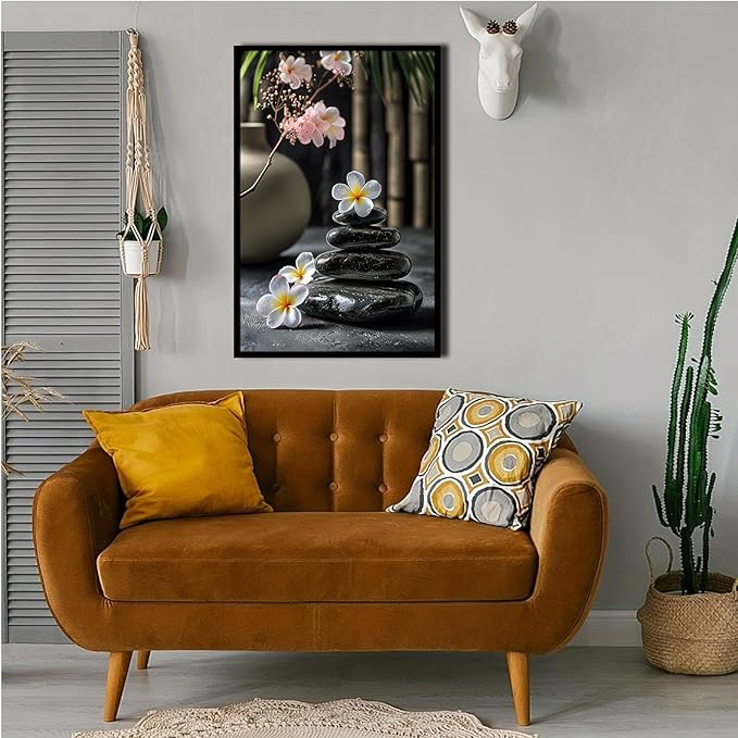 A harmonious black stone stack paired with white and pink flowers bamboo and ceramic vases creates a tranquil Zen decor for minimalist homes and mindful spaces 12x18in Metal blackFramed