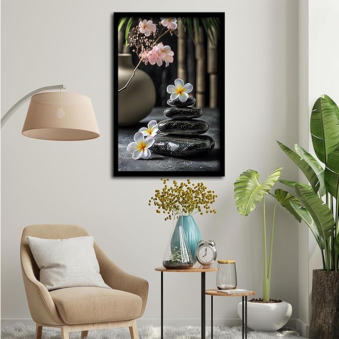 A harmonious black stone stack paired with white and pink flowers bamboo and ceramic vases creates a tranquil Zen decor for minimalist homes and mindful spaces 24x36in Metal blackFramed
