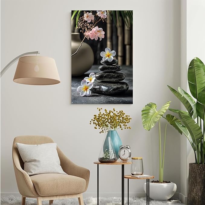 A harmonious black stone stack paired with white and pink flowers bamboo and ceramic vases creates a tranquil Zen decor for minimalist homes and mindful spaces 16x24in Wood Framed