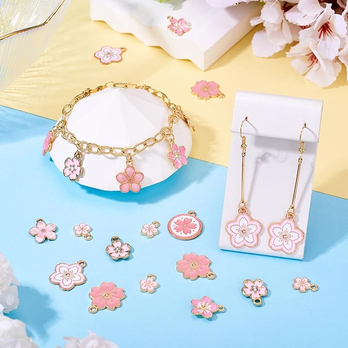 KISSITTY 100Pcs Light Gold Alloy Enamel Charms Cherry Blossom Flower Charm Bulk Gold Plated Pendant Cute Small Floral Dangle Charms for DIY Jewelry Making Kit Bracelet Necklace Keychain Crafts