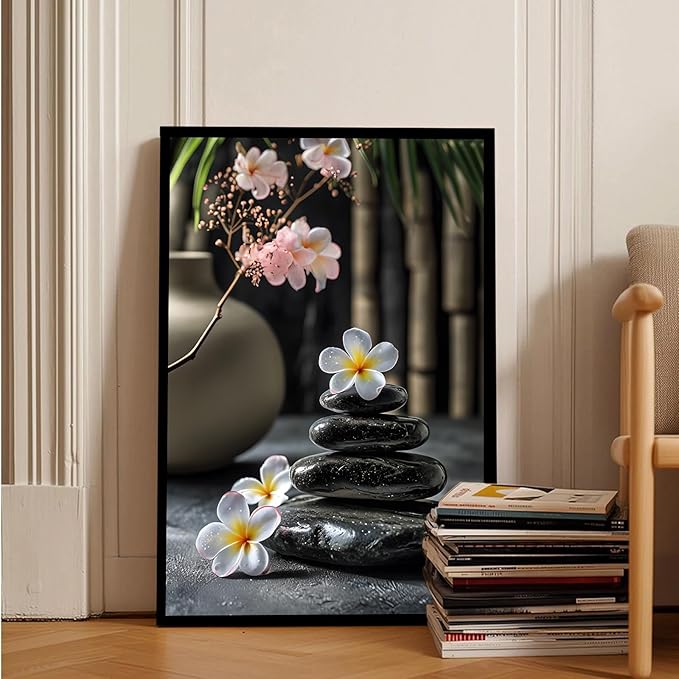A harmonious black stone stack paired with white and pink flowers bamboo and ceramic vases creates a tranquil Zen decor for minimalist homes and mindful spaces 12x18in Metal blackFramed