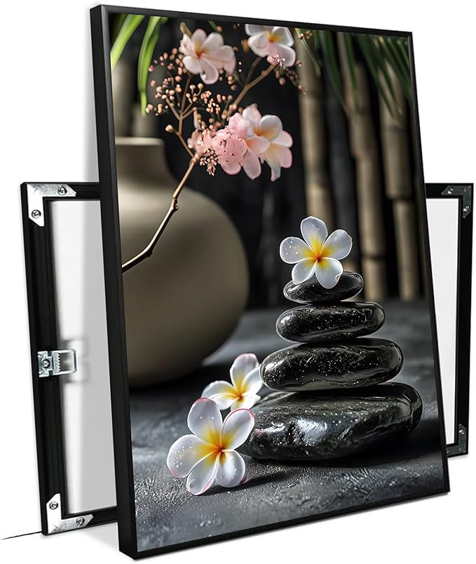 A harmonious black stone stack paired with white and pink flowers bamboo and ceramic vases creates a tranquil Zen decor for minimalist homes and mindful spaces 8x12in Metal blackFramed