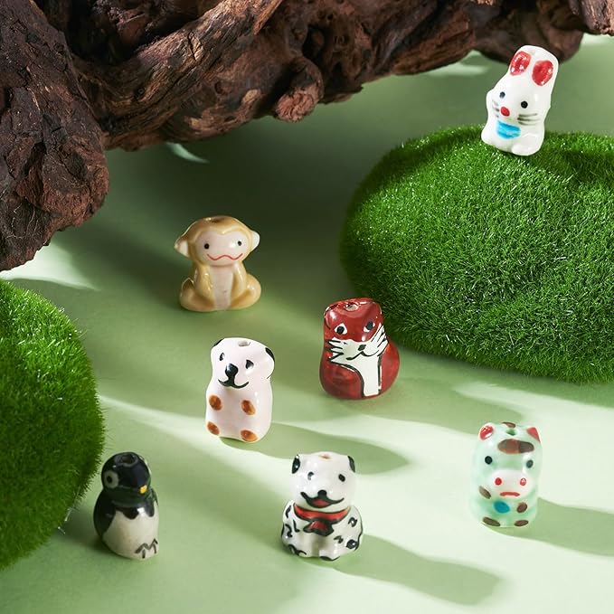 Beadthoven 7Pcs Animals Ceramic Beads, Assorted Printed Handmade Porcelain Beads Colorful Pattern Cow Rabbit Dog Penguin Loose Craft Spacers for DIY Crafts Bracelet Earring Necklace Jewelry Making
