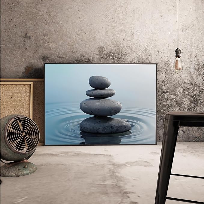 Zen wall art Harmonious grey stones stacked on a calm surface of water Serene Zen decor suitable for tranquil homes and spaces of meditation 20x30in Metal blackFramed