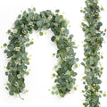 TOCHGREEN 2 PCS Artificial Eucalyptus Garland 5.9FT Faux Silver Dollar Greenery Garland Vines with White Flower Boxwood Fake Hanging Plants for Wedding Home Party Table Mantle Wall Decor