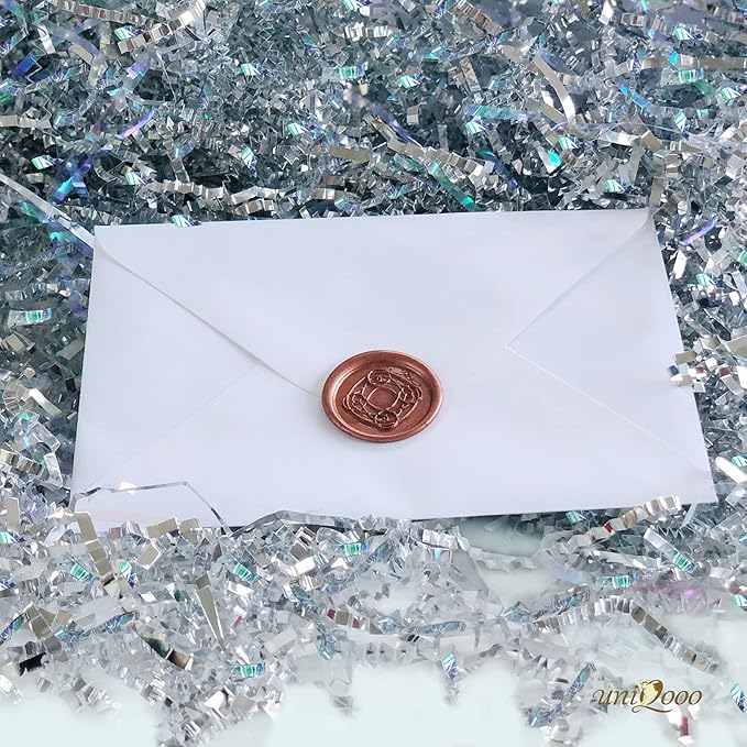 UNIQOOO 1/2 LB Metallic Iridescent Silver Crinkle Cut Paper Shredded Filler, Sparkle Crystal Unicorn Silver Paper Shreds Raffia Tissue, Craft Bedding Cushion, For Christmas Gifts Wedding Birthday
